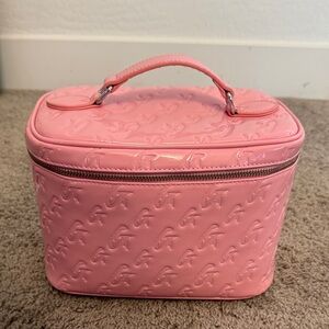 Pre-loved Glamaholic Embossed Pink Toiletry bag